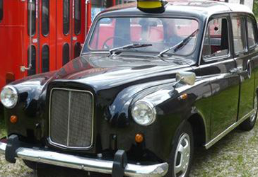 Amerikanische Schulbusse,Londonbusse,Londontaxi,Stretchlimo,Showtrucks,Eventzelte